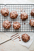 Chocolate-coated oat biscuits with sugar sprinkles