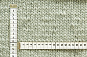 A counting frame on a piece of knitting