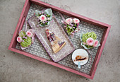 Small posies and cake on tray