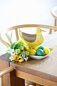 Easter posy, Easter eggs and duck ornament on table
