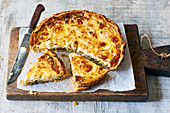 A caramelised onion and goat's cheese tart, sliced