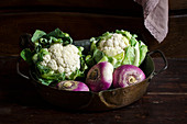 A still life of cauliflower and turnips