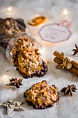 Florentines with chocolate glaze, cinnamon sticks and star anise (Christmas)