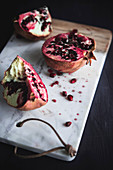 Pomegranate on A Chopping Board