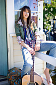 Young woman with guitar