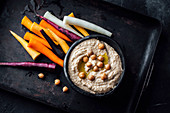 Hummus and colourful carrot sticks