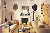 Two sofas facing one another in beige living room