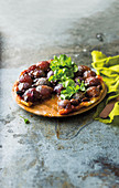 Red onion and olive tarte tatin