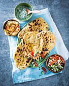 Naan with fennel seeds and spreads