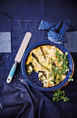 Spanish potato frittata with green vegetables and feta cheese