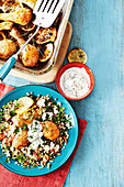 Roast chicken drumsticks with pearl couscous and tzatziki