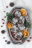 Christmas poppy seed and orange tray cake on a platter
