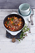 Sweet potato and lamb stew with rice and dates