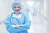 Male surgeon smiling towards camera