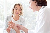 Mature woman showing gp painful hand