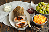 Baked pork loin stuffed with prunes and dried apritots, brussel sprouts, sweet potatoes pure
