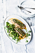 Spiced salmon with a wild herb salad
