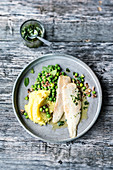 Plaice fillet with bacon peas and mint gremolata