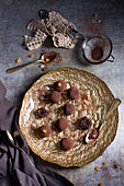 Spiced chocolate truffles on a golden plate