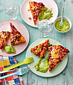 Texmex pizza slices with a pea dip