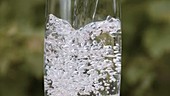 Water in glass, slow motion