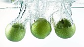 Apples in water, slow motion