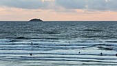 Surfers at Polzeath, Cornwall