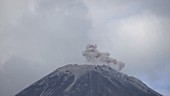 Reventador volcano erupting