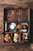 Various biscuits in a rustic wooden case