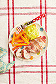 Turkey steak wrapped in bacon with mushy pea mash and carrots