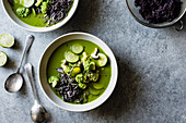 Green thai vegetable soup with cilantro and black rice noodles (Thailand)