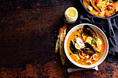 Seafood soup with aioli and parmesan toasts