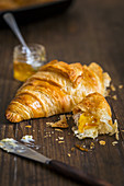 A croissant with orange marmalade (close up)