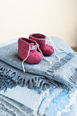 Crocheted lace-up baby booties
