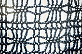 A lacy crocheted shawl (detail)