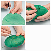 A pin cushion being sewn by hand