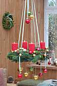 Hanging Christmas Wreath With Red Candles