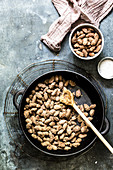 Crunchy sugar coated almonds in a pan
