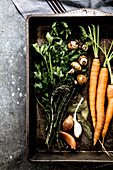 Carrots, mushrooms, rosemary, garlic, parsley and bay leaves