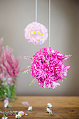 Flower balls made from chrysanthemums and heather