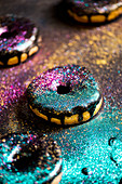 Donuts with chocolate icing and glitter