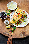 Stuffed Mexican omelette with an avocado dip