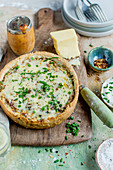 Quiche with cheese, chives and chilli flakes