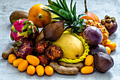 Exotic fruits on a concrete background