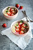 Smoothie bowls with strawberries and granola
