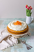 Carrot cake decorated with cream cheese