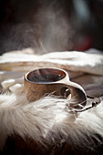 Hot coffee in a Kuksa mug