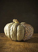 Pumpkin decorated with golden studs