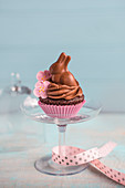 Easter chocolate cupcake on a glass stand
