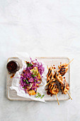 Asian chicken skewers with nashi slaw